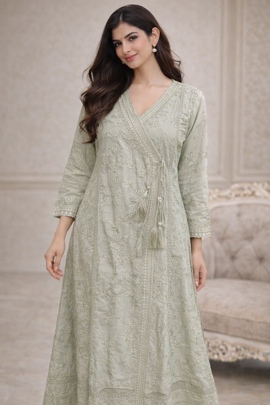 A Light Green Embroidery Angrakha Kurti with Tassel Detail and Lace Trim