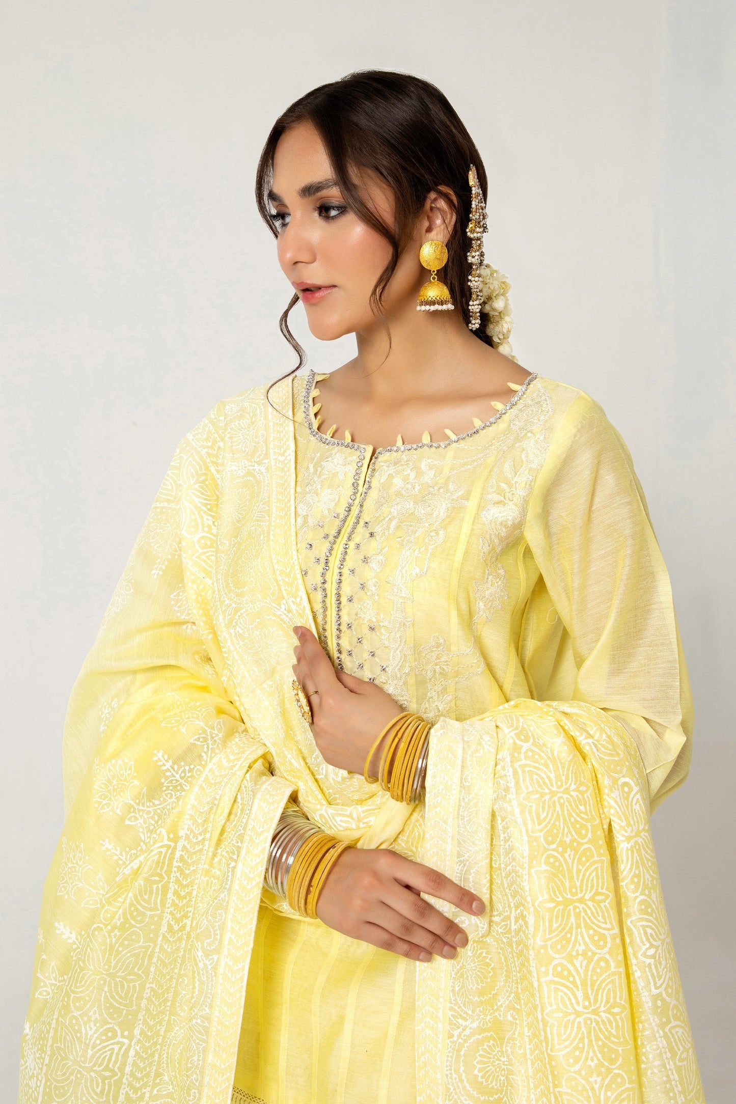 “Sunlit Elegance” evokes the bright yellow shade and festive vibe - “This outfit is perfect for Eid celebrations in Australia”