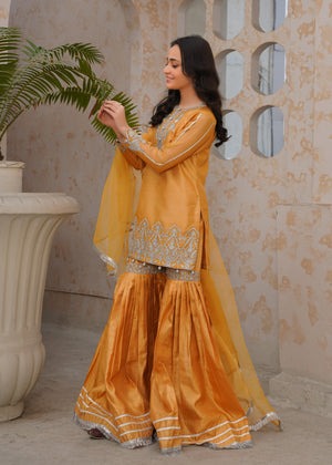 Gold Raw Silk Gharara Set with Silver Embroidery & Organza Dupatta – 3-Piece Festive Ensemble